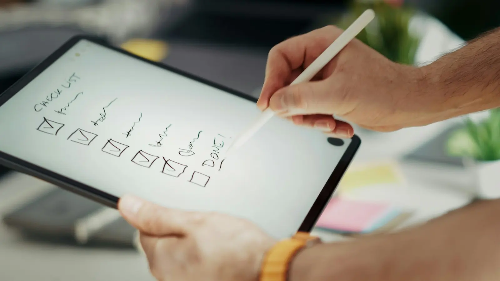 Small business owner reviewing a plain-English IT checklist at a desk